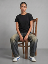 black-pure-cotton-everyday-tee-front-angle-model-pose-1-uptownie.png