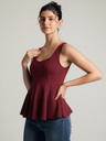 maroon-stretchable-ribbed-peplum-top-side-angle-uptownie.png