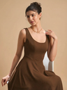 brown-stretchable-corset-fit-and-flare-midi-dress-fabric-front-zoom-in-uptownie.png